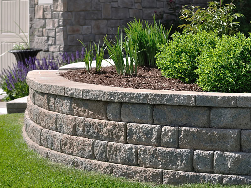 js-rw-2 Unilock Retaining Wall with Landscaping
